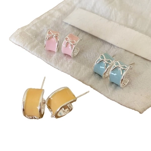 Sweet Korean style bow stud earrings in pink blue and yellow enamel with silver needles