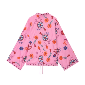 Pink bohemian embroidered loose cardigan shirt with floral patterns on white background