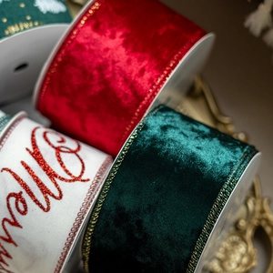 Velvet Christmas ribbons in red, green, and white with golden edges for festive decoration