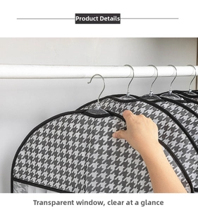 Detail of breathable garment cover with houndstooth pattern and clear viewing window