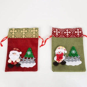 Christmas drawstring gift bags with Santa and Snowman appliques in red and green colors