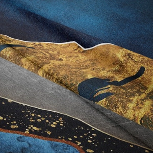 Detailed macro view of soft flannel fabric texture with mountain art print