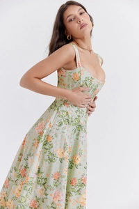 Detail of floral print dress with corset bodice and orange pink flower patterns