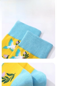 Detail of high-elasticity cuff and ergonomic 3D heel on cotton bird pattern socks