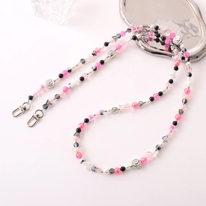Beaded crossbody phone strap featuring pink and black rose and cross charms
