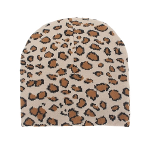 Close-up of leopard print pattern on warm beige jacquard knit beanie for outdoor use
