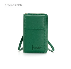 Detailed view of green PU leather phone bag with lychee texture and brand logo