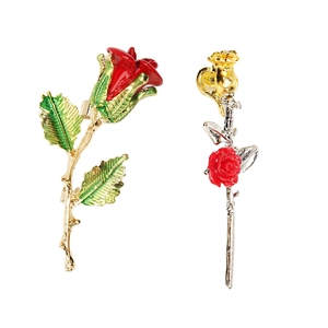 Luxurious rose and leaf brooch set in red enamel with gold and silver alloy finish