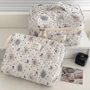 Quilted cotton travel pouch set with bear patterns and blue stripes for cosmetics