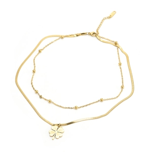Collana doppia dorata con quadrifoglio e catenina a sfere in acciaio titanio