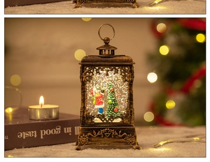 Detail of vintage Christmas lantern with Santa scene and warm LED glowing snow