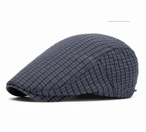 Close-up of British retro black and white plaid pattern on a lightweight beret hat
