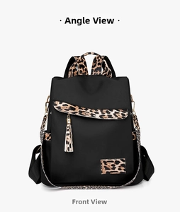 Front detail of oxford fabric anti-theft backpack with stylish leopard print patchwork