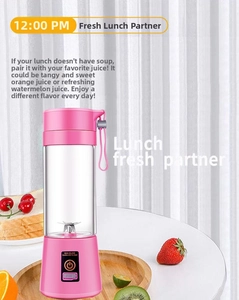 Detail of pink portable blender with sharp steel blades and double click start button