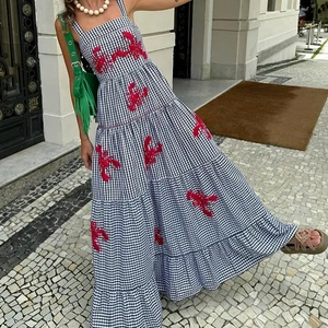 Black and white gingham maxi dress with red lobster print and layered pleated hemline