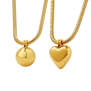 Gold plated stainless steel snake chain necklace with sphere and heart pendant charms