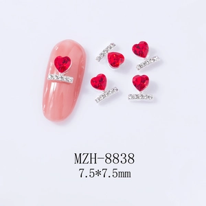 Detail of red heart-shaped nail art crystals with silver diamond-set bars, 7.5x7.5mm