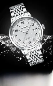 Close-up of waterproof mechanical watch with white dial and water splash effect