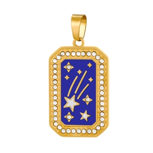Detail of gold meteor and star pendant with blue enamel and sparkling zircons