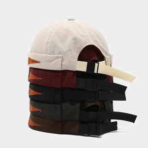 Adjustable quick-dry Miki hats in five colors with vintage patch and buckle straps