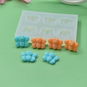 Silicone bee mold for DIY candles and fondant with 6 detailed honeybee cavities
