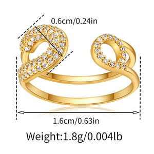 Detail view of gold zircon bow ring with dimensions 0.6cm width and 1.6cm diameter
