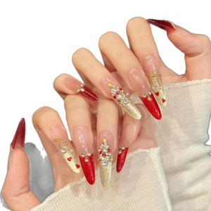 Christmas press-on nails with red cat-eye base and miniature glitter Christmas tree art