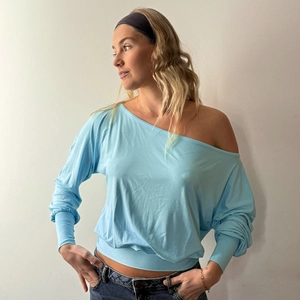 Chic light blue off-shoulder long sleeve top for women with a slim fit waist design