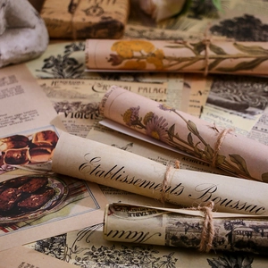 Vintage scrapbooking paper roll with botanical illustrations and artistic calligraphy