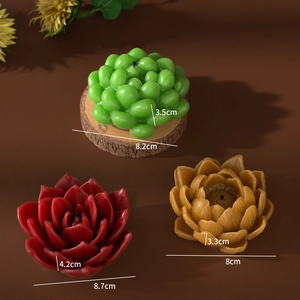 Detailed view of succulent candles in green and red with precise dimensions shown