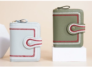Short women's wallets in blue and green with litchi texture and embroidered details