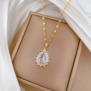 Waterdrop crystal pendant necklace with champagne gold chain and pavé diamond border