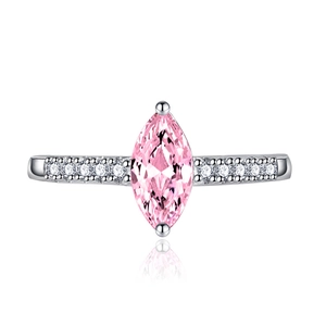 Marquise cut pink gemstone ring in silver setting with side accent diamonds and reflection