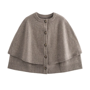Women's knit poncho cardigan with amber buttons in dark oatmeal color, flat lay view
