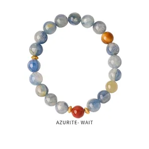 Macro shot of azurite beaded bracelet with multi-gemstone accents and gold spacers
