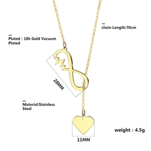 Detail view of gold infinity and heartbeat pendant with dimensions 70cm chain and 28mm size