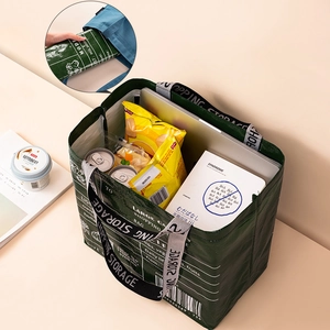 Green foldable woven shopping bag with large capacity and reinforced handles