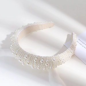 Baroque style wide headband featuring multiple sizes of pearls for bridal hair styling