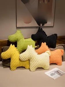 Detail of embossed double-sided fleece pony pillows in vibrant various colors