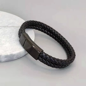 Double-layered braided leather bracelet for men featuring a polished magnetic steel clasp