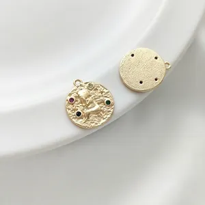 14K gold plated round angel pendant with colorful cubic zirconia and star detail