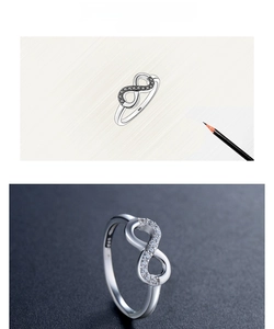 Dettaglio anello infinito in argento S925 con schizzo di design e incastonatura micro-pavé
