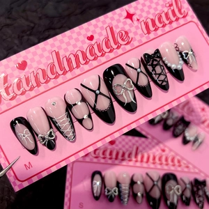French black and pink press-on nails with 3D bows and pearls in almond shape
