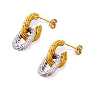 Interlocking geometric oval stud earrings in gold and silver finish on white background