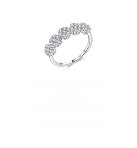 Macro shot of S925 sterling silver ring featuring five flower patterns with cubic zirconia