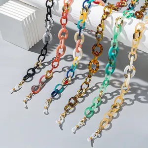 Macro shot of colorful acrylic eyeglass chains with metal lobster clasps and silicone loops