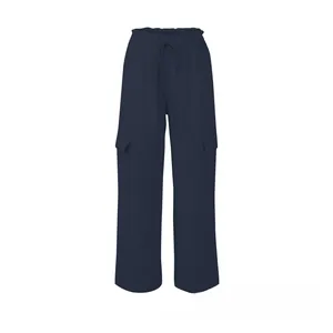 Detail of navy blue wide-leg cargo pants featuring drawstring waist and flap pockets