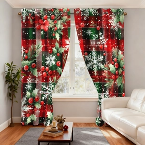 Detail view of red and green plaid Christmas curtains with holly berry and snowflake prints