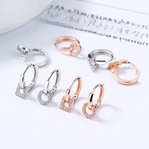 Detailed macro view of S925 sterling silver hoop earrings with micro-pave cubic zirconia