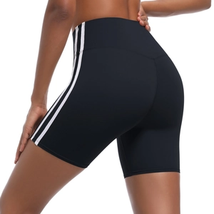 Close-up of high-waist black fitness shorts featuring iconic side triple-stripe detail